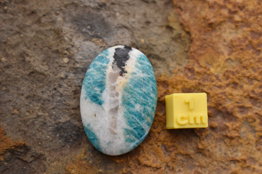 Amazonite with quartz and magnetite inclusion- Oval 32.2 x 22.5 x 7.3