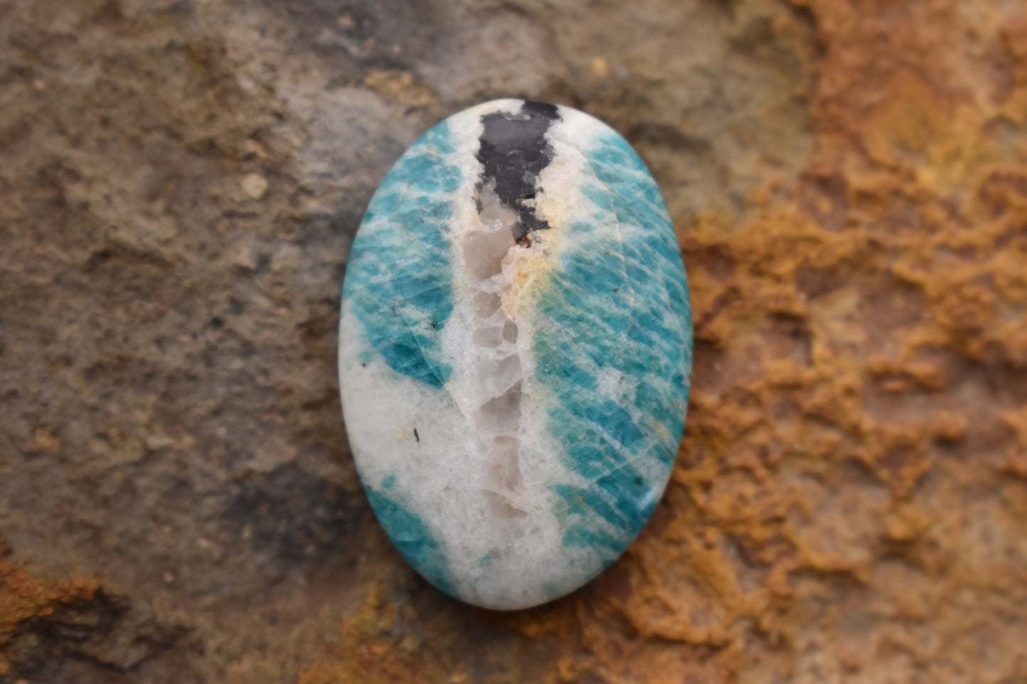 Amazonite with quartz and magnetite inclusion- Oval 32.2 x 22.5 x 7.3