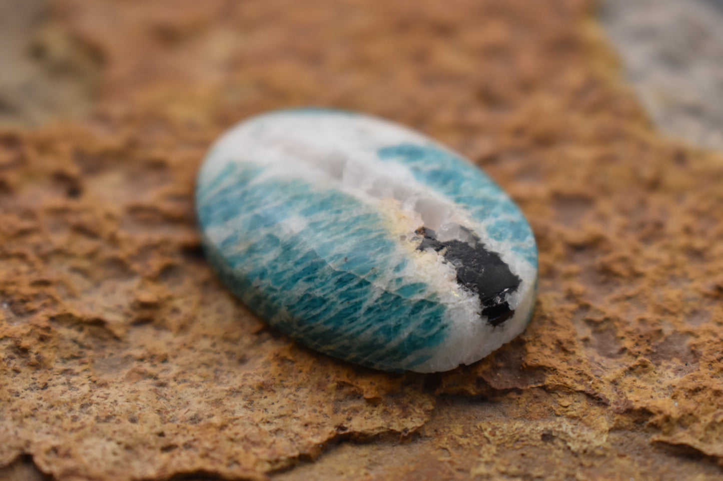 Amazonite with quartz and magnetite inclusion- Oval 32.2 x 22.5 x 7.3