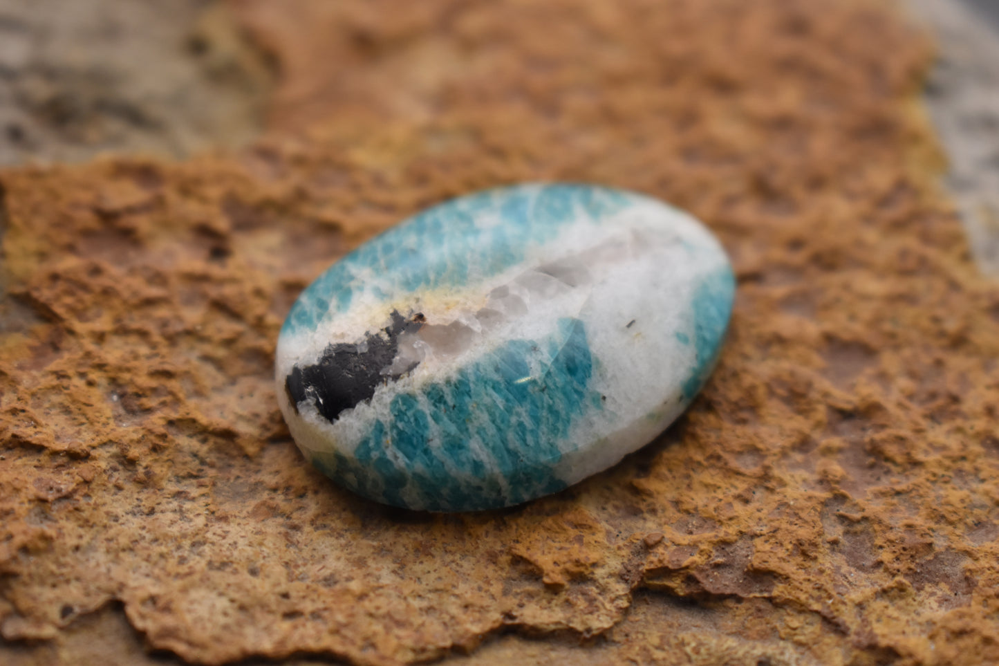 Amazonite with quartz and magnetite inclusion- Oval 32.2 x 22.5 x 7.3
